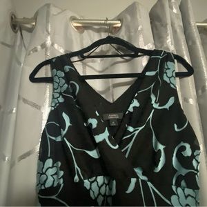 Dress Barn collection size 10. Black with light teal flower print all over.